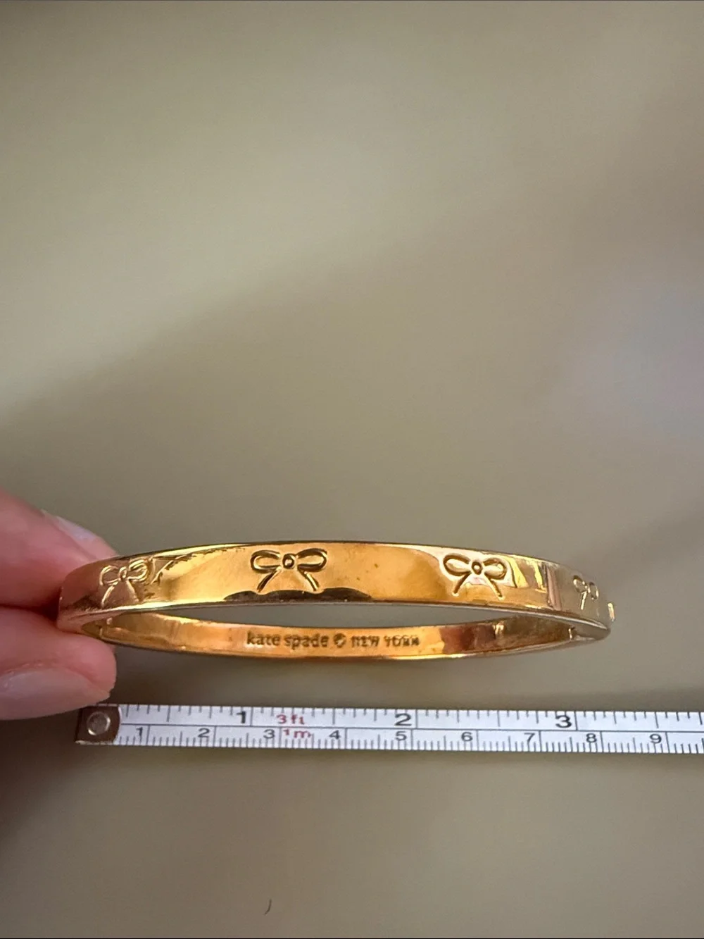 kate spade Gold Bow-Embossed Bangle Bracelet